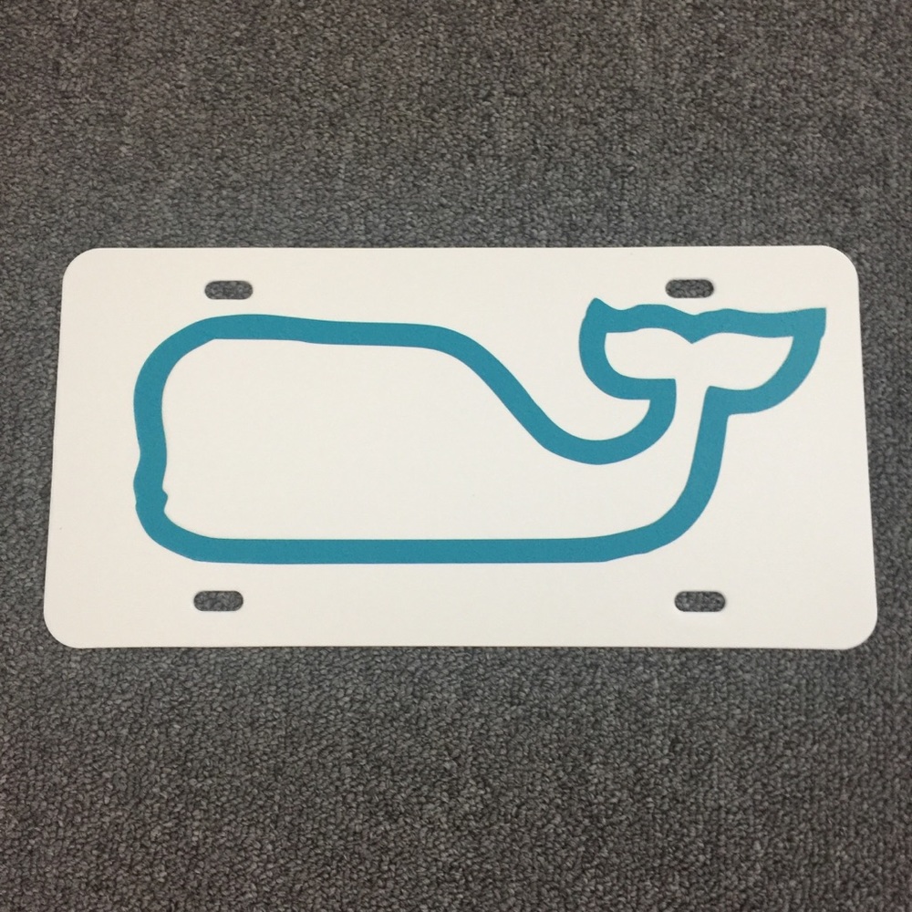 White car tag with turquoise whale